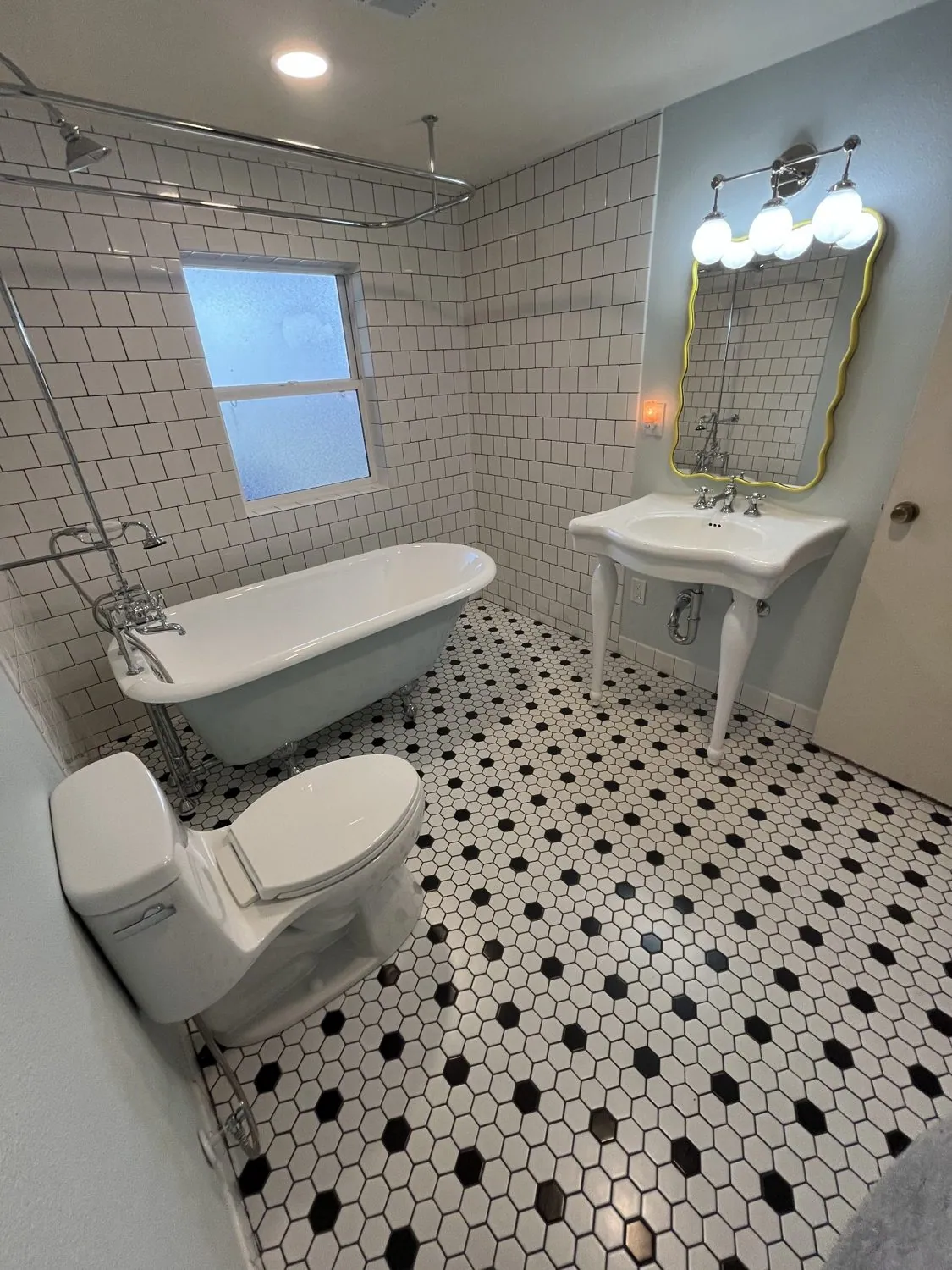 All-Pro bathroom remodel with freestanding tub and walk-in shower